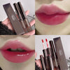 Collage of lip products including a lipstick, lip gloss, and packaging.