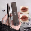 Lip gloss with packaging held by a hand, close-up of lips with gloss applied.