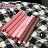 Set of lipsticks in various shades on a checkered fabric background with 'Gege Bear' branding.