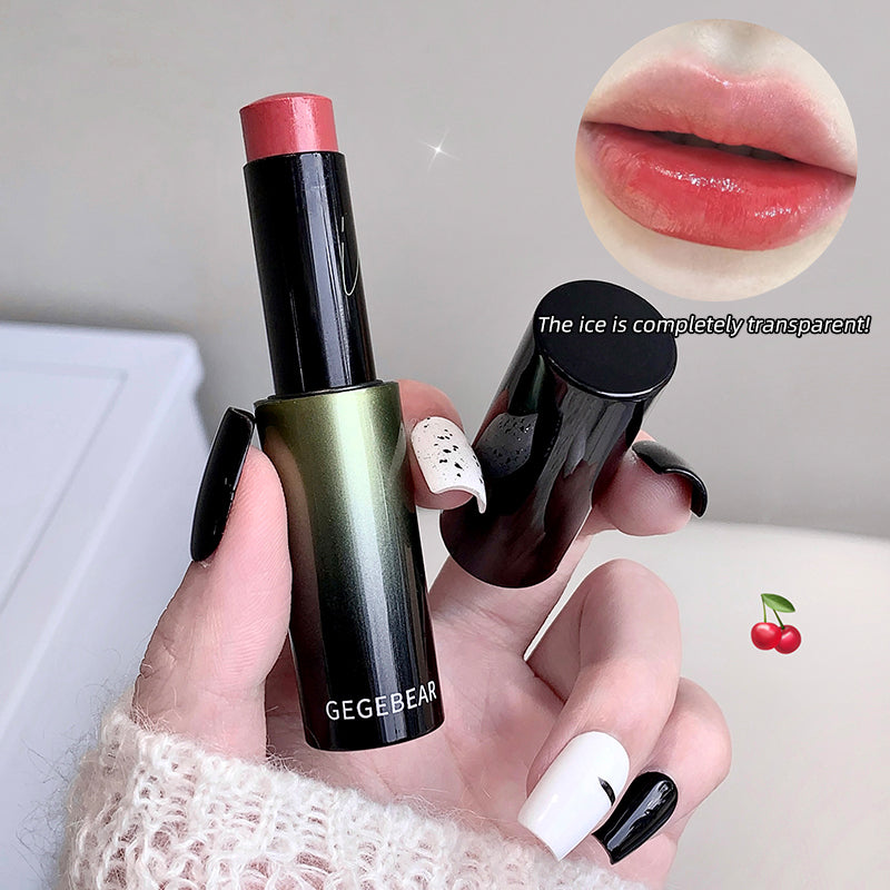 Lipstick held by a hand with a close-up of lips and text overlay on a light background