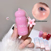 Pink blush stick with a flower charm held by a hand, close-up of blush application, and additional blush sticks in the background.