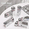 Silver and pink cosmetic products with 'Gege bear' branding on a white surface.