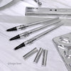 GEGE BEAR makeup brushes and packaging on a white surface