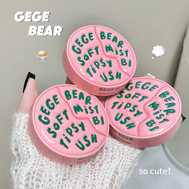 Three pink containers with green text labeled 'GEGE BEAR' on a light gray background.