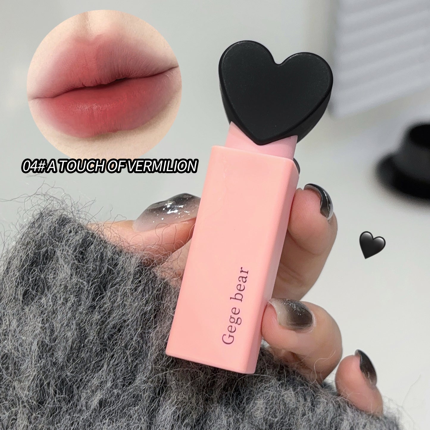 Pink lipstick with heart-shaped cap held by a hand, close-up of lips shown with '04# A Touch of Vermilion' text.