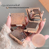 Rose gold makeup compact with decorative design held by a hand