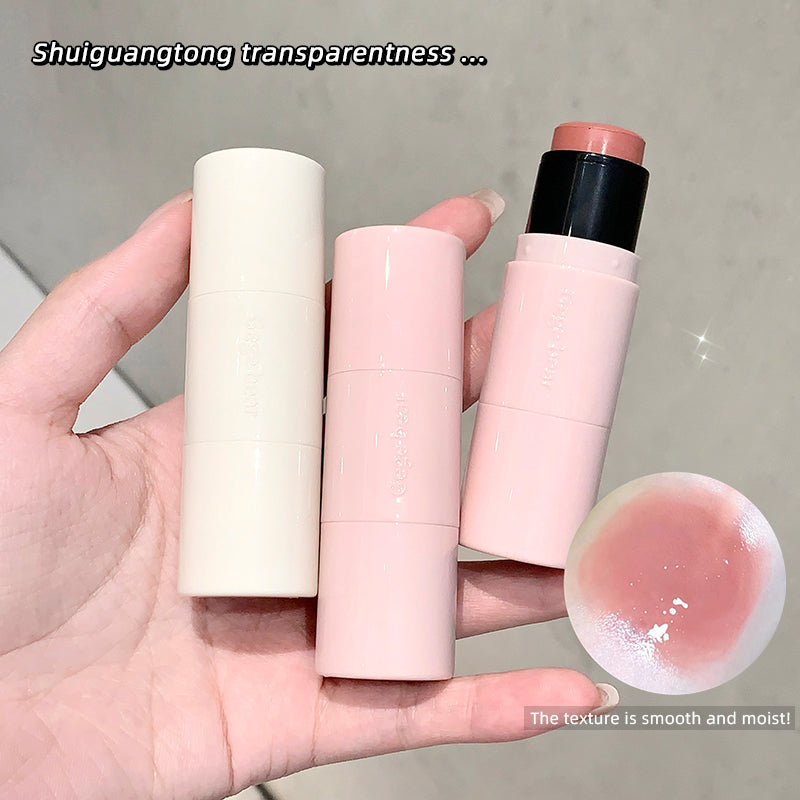 Three lip balm sticks held in a hand with an inset showing the texture of the lip balm.