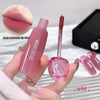 Pink lip tint with applicator held by a hand, close-up of lips shown, brand 'GEGE BEAR' visible.