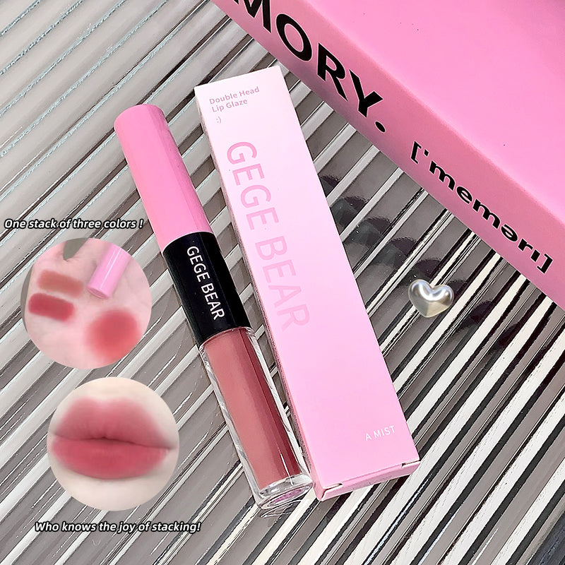Pink lip gloss with packaging on a striped background