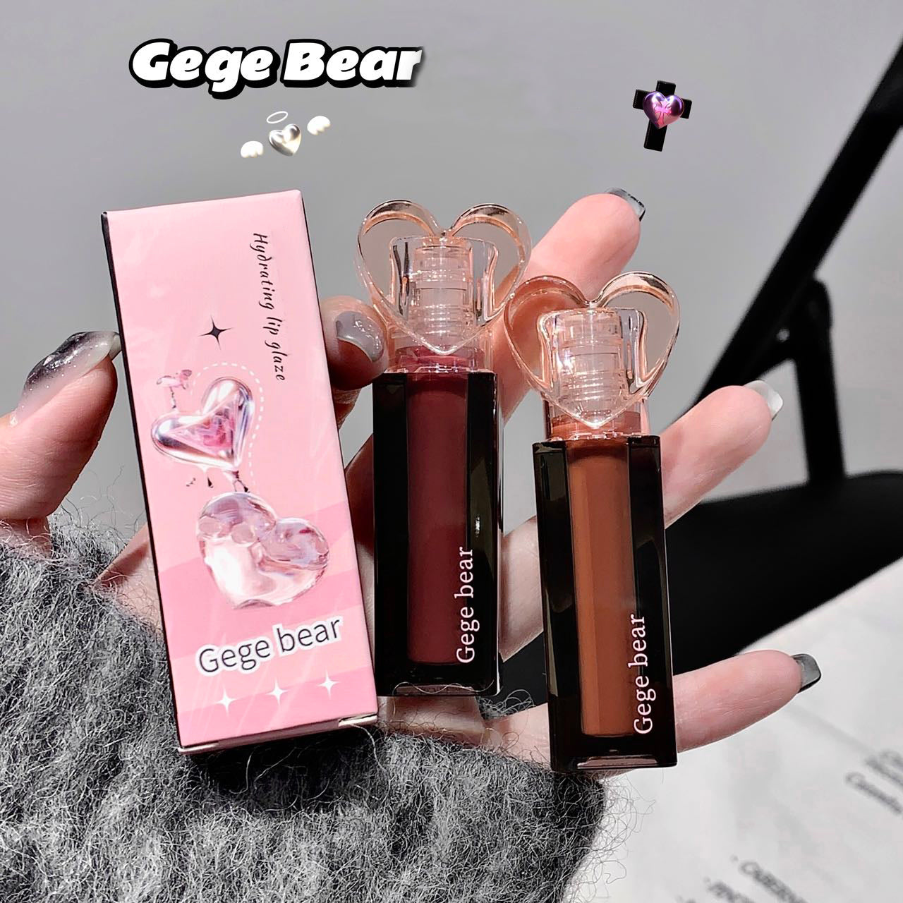 Two lipsticks with a pink box labeled 'Gege bear' held by a hand.
