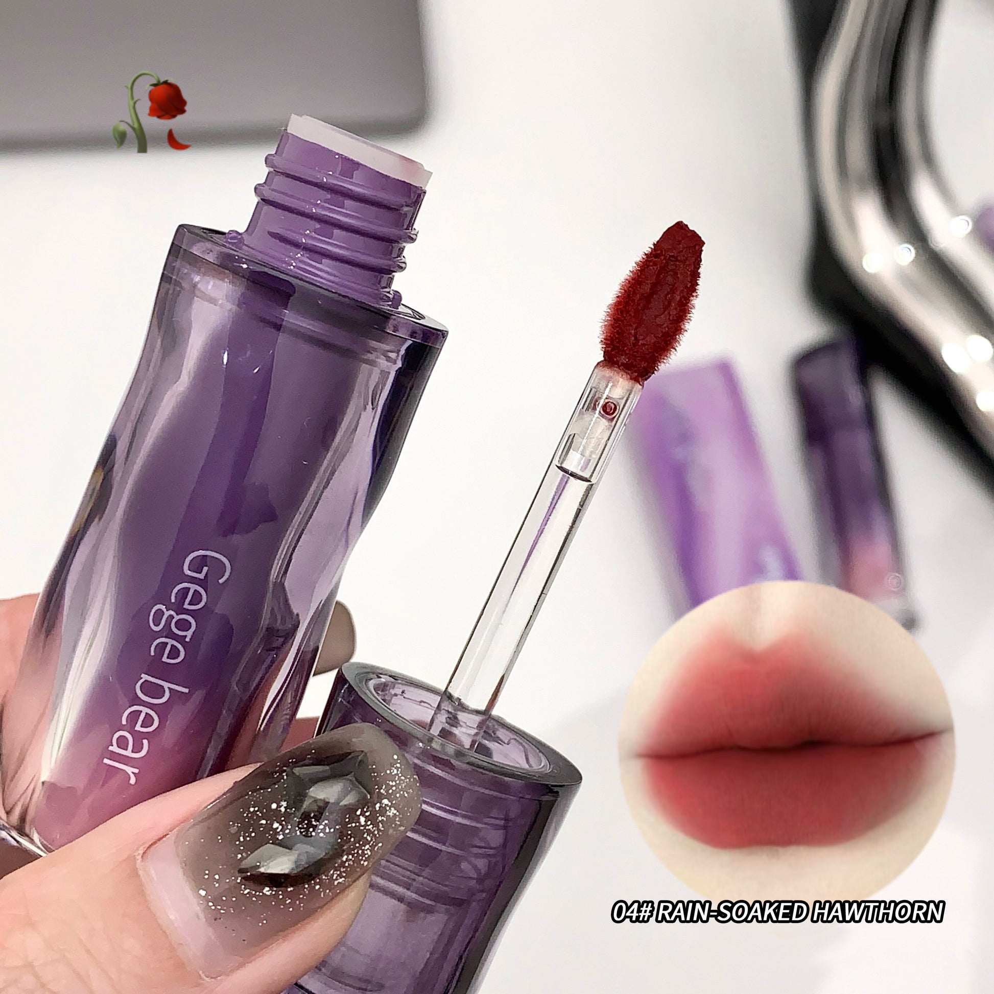 Purple lip gloss with applicator and close-up of lips wearing the product