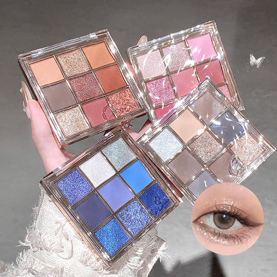 Four eyeshadow palettes with different color schemes held by a hand, with an inset showing a close-up of an eye wearing the makeup.