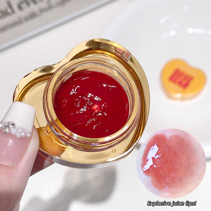 Red gel in a gold container with a blurred background