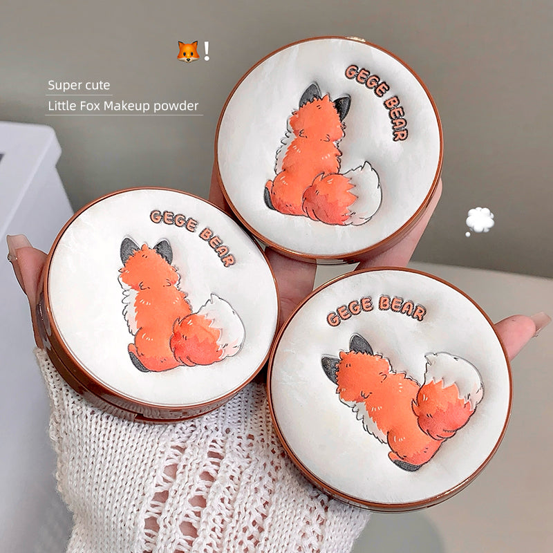Three GECE BEAR Little Fox Makeup powder cases held by a hand.