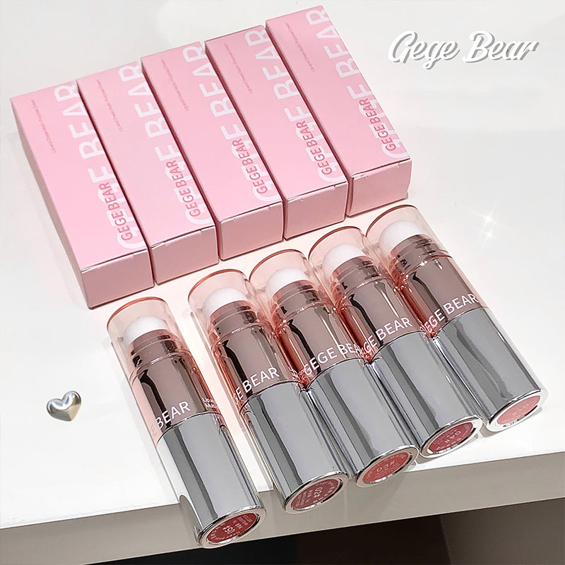 Set of Geye Bear lipsticks and boxes on a white background