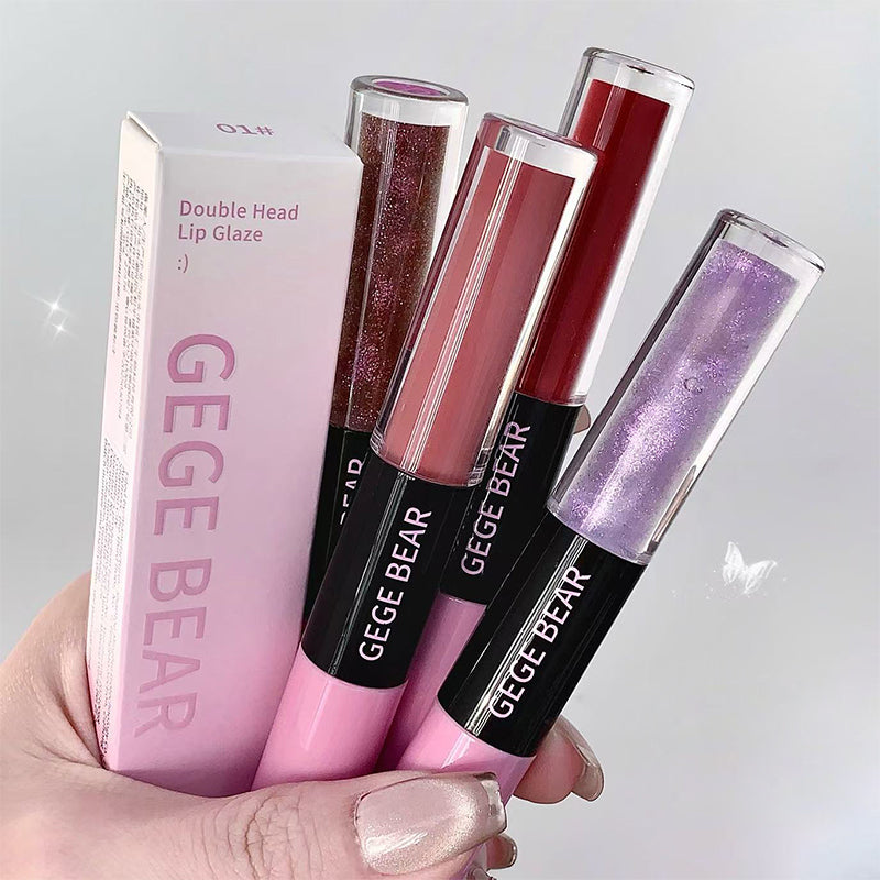 GEGE BEAR lip glosses held by a hand against a light gray background