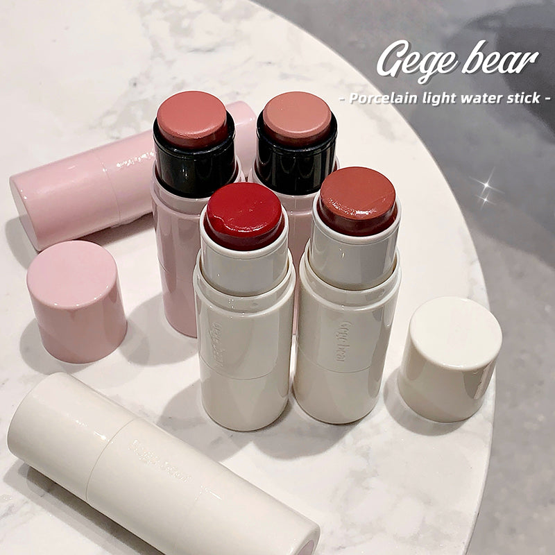 Set of Gege bear porcelain light water sticks on a marble surface