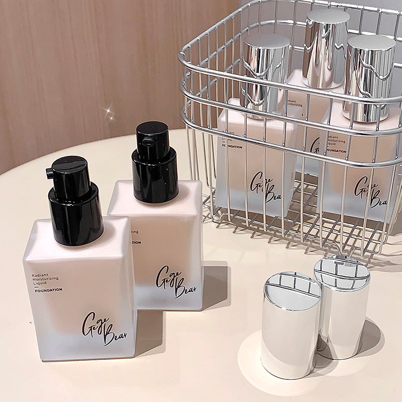 Cosmetic products with 'Gloe Bear' branding on a neutral background