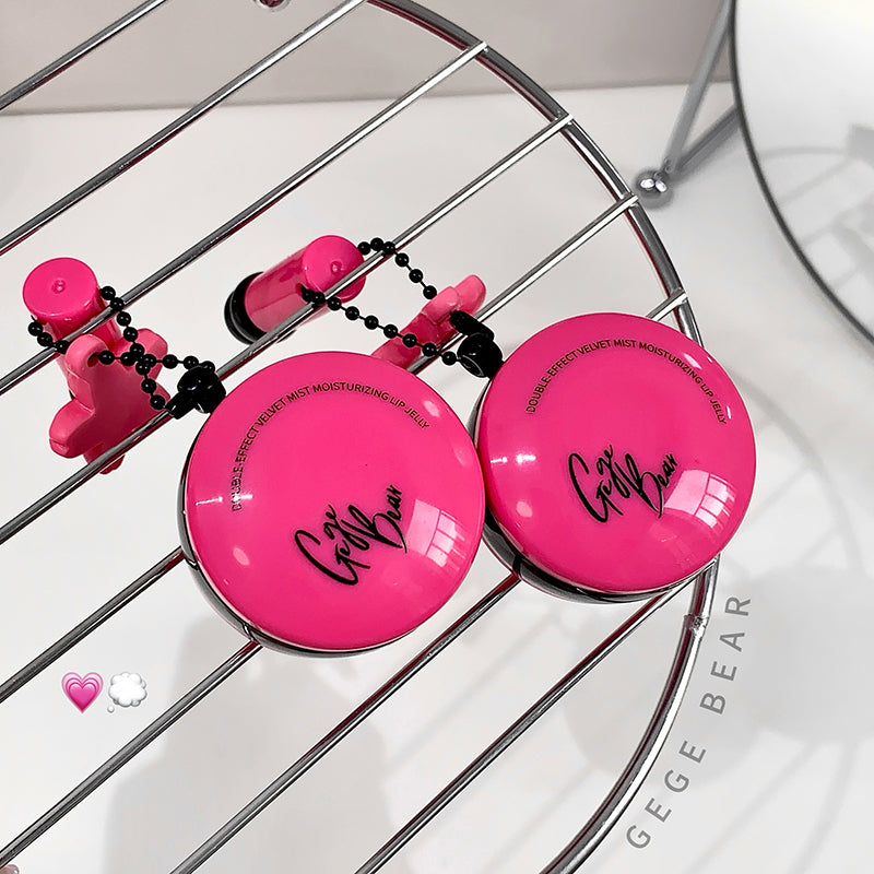 Pink round containers with black text on a metal rack, branded 'Geege Bear'.