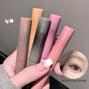 Five GEGE BEAR cloud mist eyebrow tints held by a hand, with a close-up of an eye wearing the product.