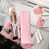 Pink makeup product with 'GEGE BEAR' branding held by a hand.