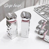 Silver dental models with pink bases on a white surface, branded 'Gege bear'.