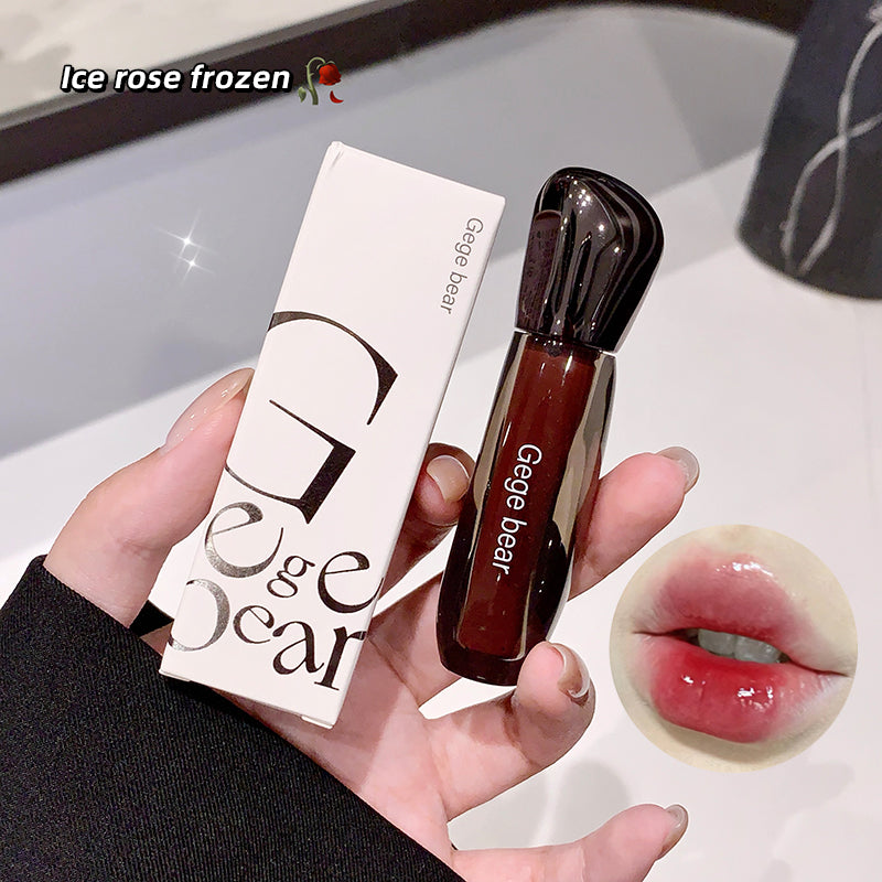 Hand holding a Gege bear lip gloss with packaging and a close-up of lips wearing the product.