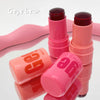 Pink lip balm sticks with 'Gee' branding on a white background