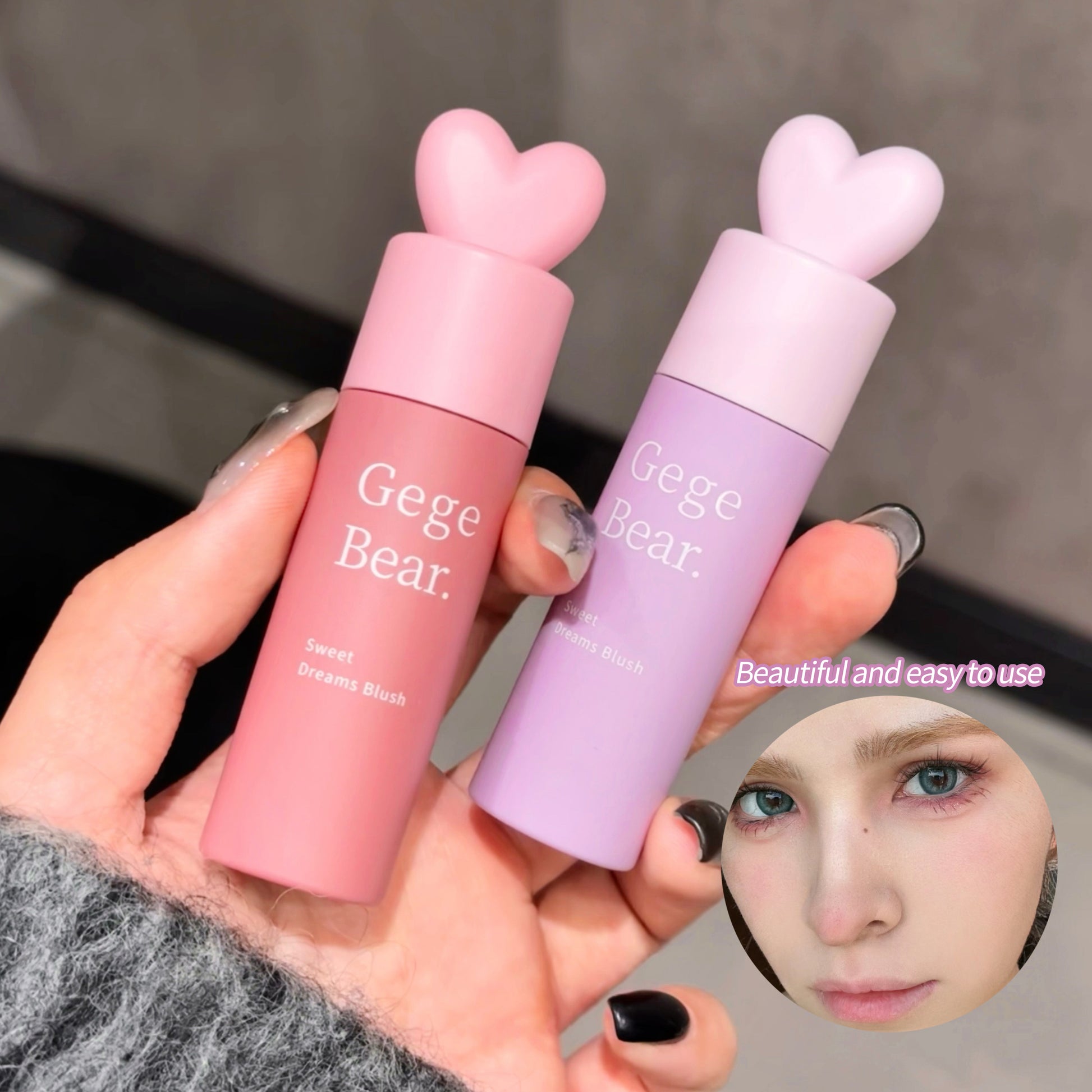 Two Gege Bear blushes held by a hand with a blurred background