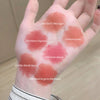 Hand with various colored blushes applied in circular patterns, labeled with names.