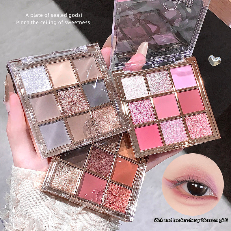 Makeup eyeshadow palettes with a close-up of an eye wearing pink makeup.