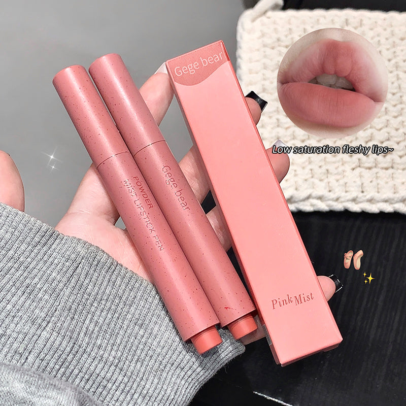 Pink lip gloss set with a close-up of lips wearing the color on a textured surface.