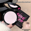 Compact powder with a mirror and packaging labeled 'Setting Powder' held by a hand.