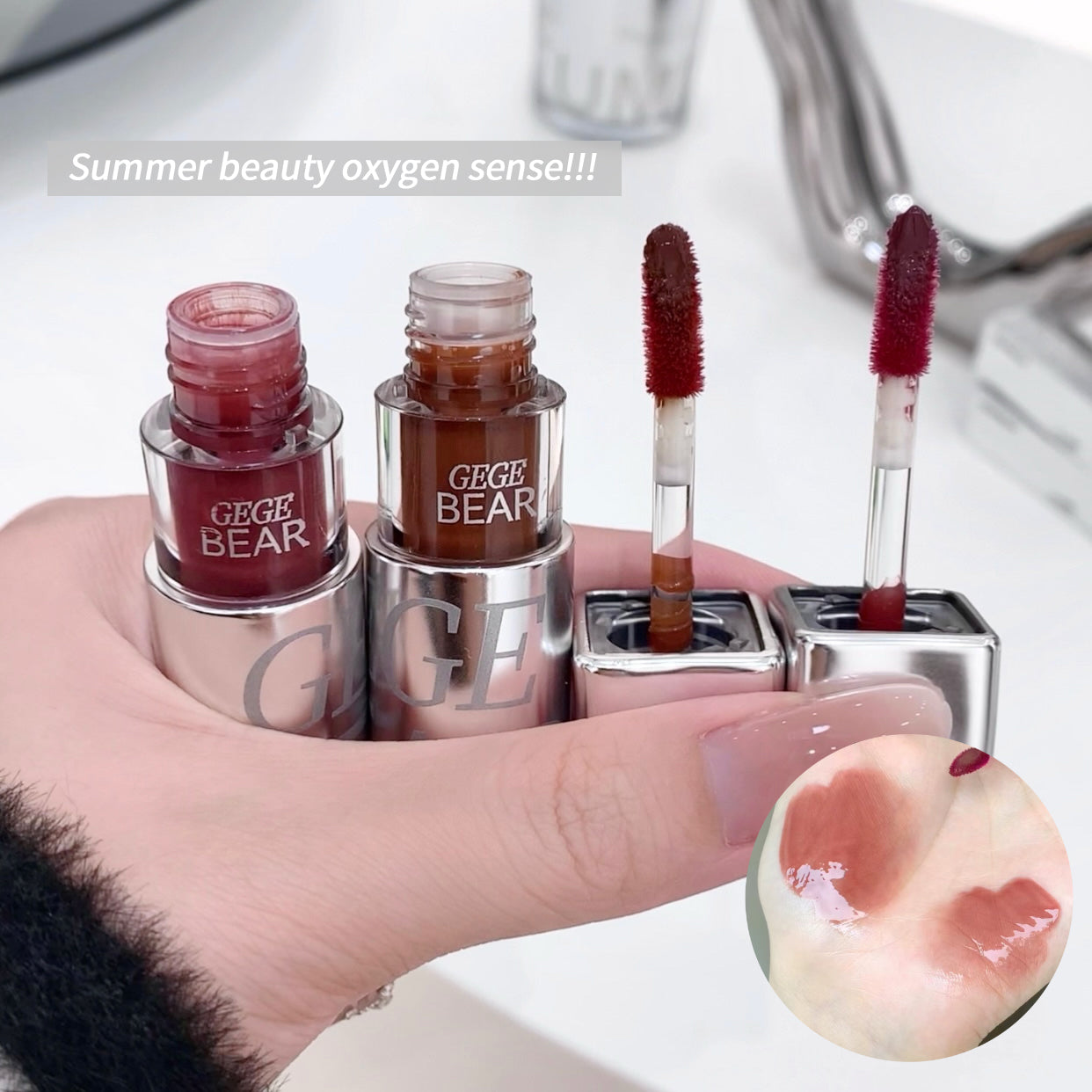 Hand holding GEGE BEAR lip products with a peach slice on a white background