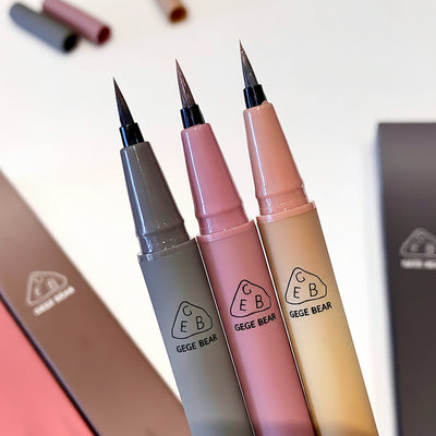 Three pens with 'GEGE BEAR' branding on a white background
