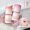 Two skincare products with 'Stick' branding held by a hand, with a blurred face in the corner.