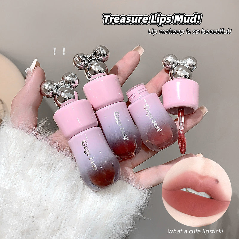 Pink lip makeup product with gradient effect held by a hand, close-up of product, and lips with product applied.