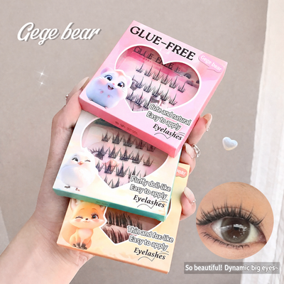 Eyelash packaging with cartoon bear illustrations and text on a neutral background