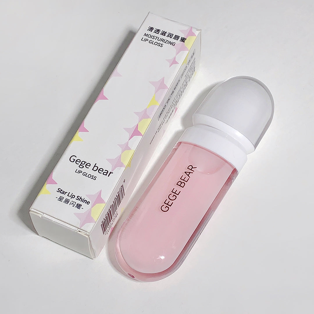 Pink lip gloss with white cap and 'GEGE BEAR' branding on a light gray background