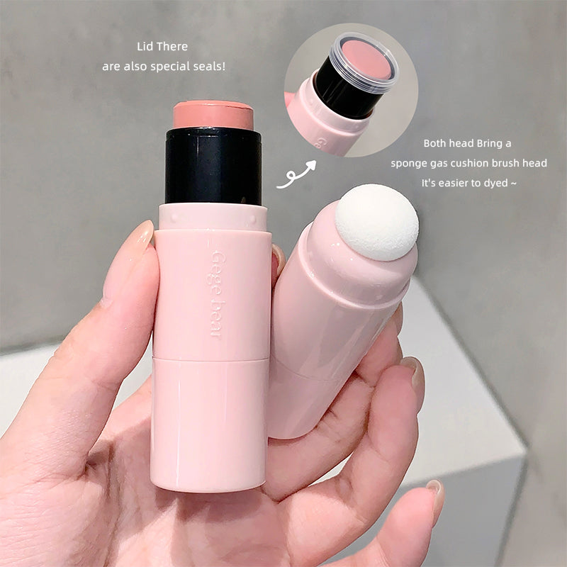 Two pink makeup products held in a hand with text explaining features.