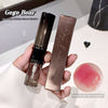 Gege Bear double-head fixing raincoat lipstick with packaging and a swatch on a white surface.