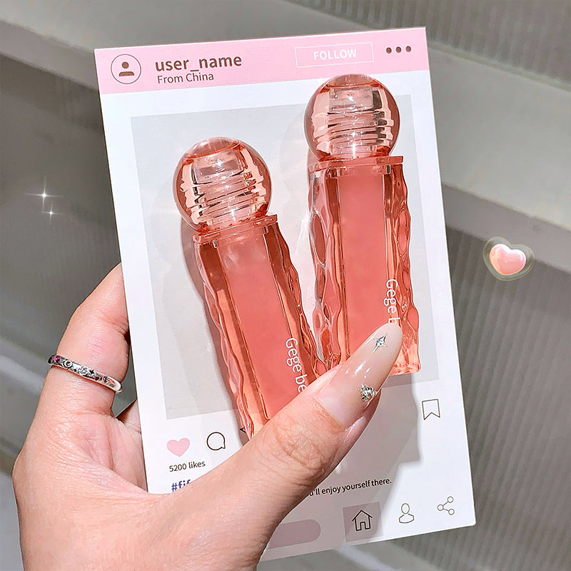 Hand holding a pink bottle with packaging labeled 'user_name' from China