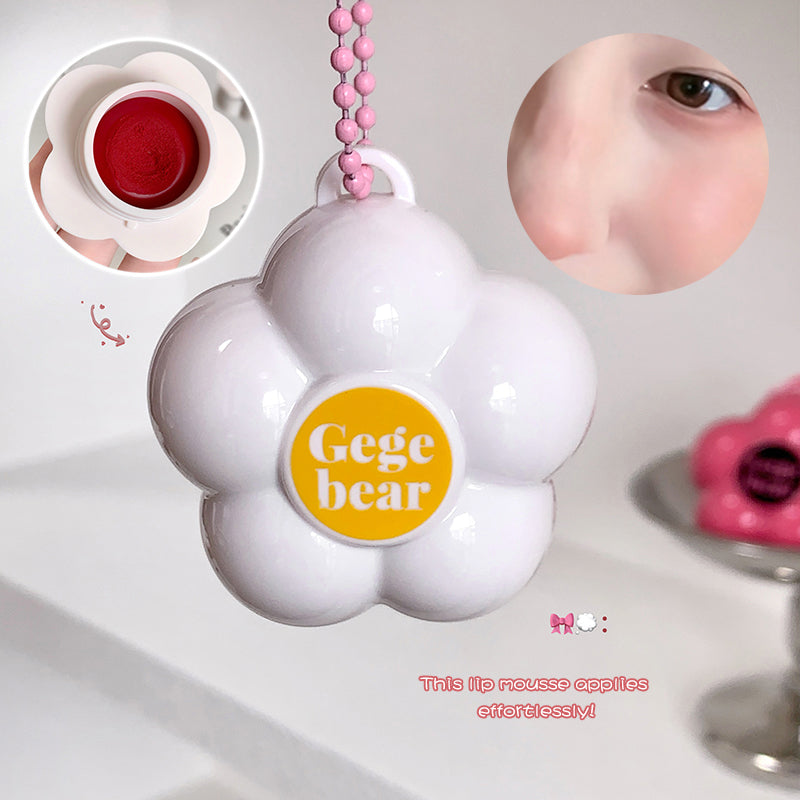 White flower-shaped lip balm with 'Gege bear' branding on a white background