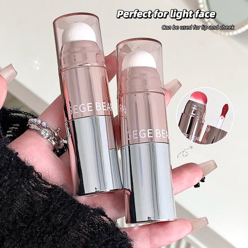 Two lip products held in a hand with text indicating their use for light faces.