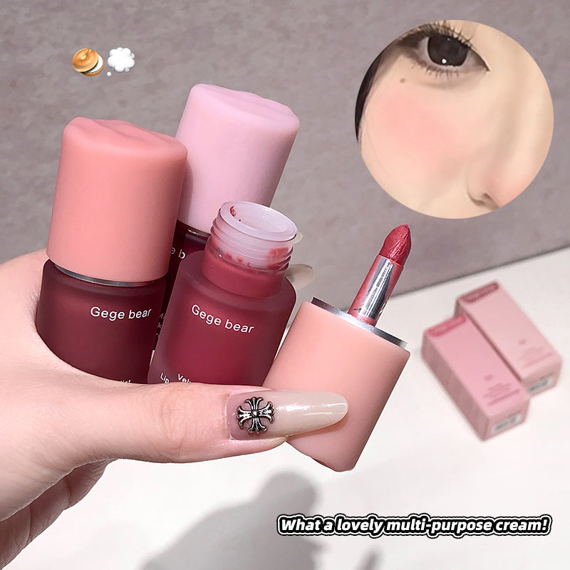 Hand holding a pink and red lip product with 'Gege bear' branding, close-up of eye makeup, and text 'What a lovely multi-purpose cream!'.