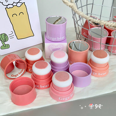 Set of pink and purple containers with lids on a white surface, featuring 'Gege bear' branding.