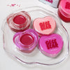 Heart-shaped container with GEGE BEAR lip jelly products on a white background