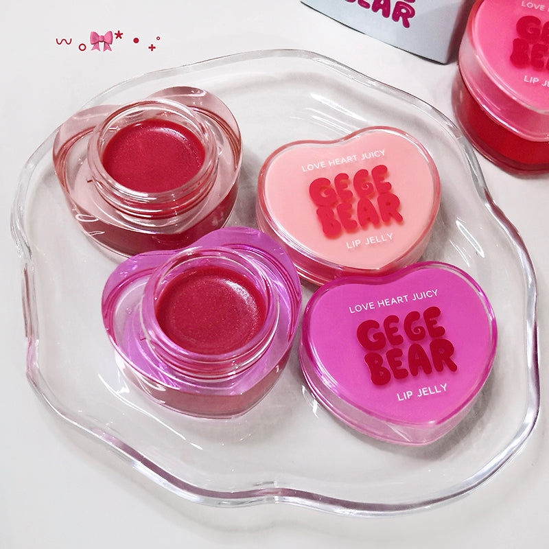 Heart-shaped container with GEGE BEAR lip jelly products on a white background