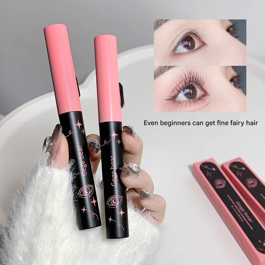 Two pink makeup products with black accents held by a hand, with an inset showing eye makeup application.