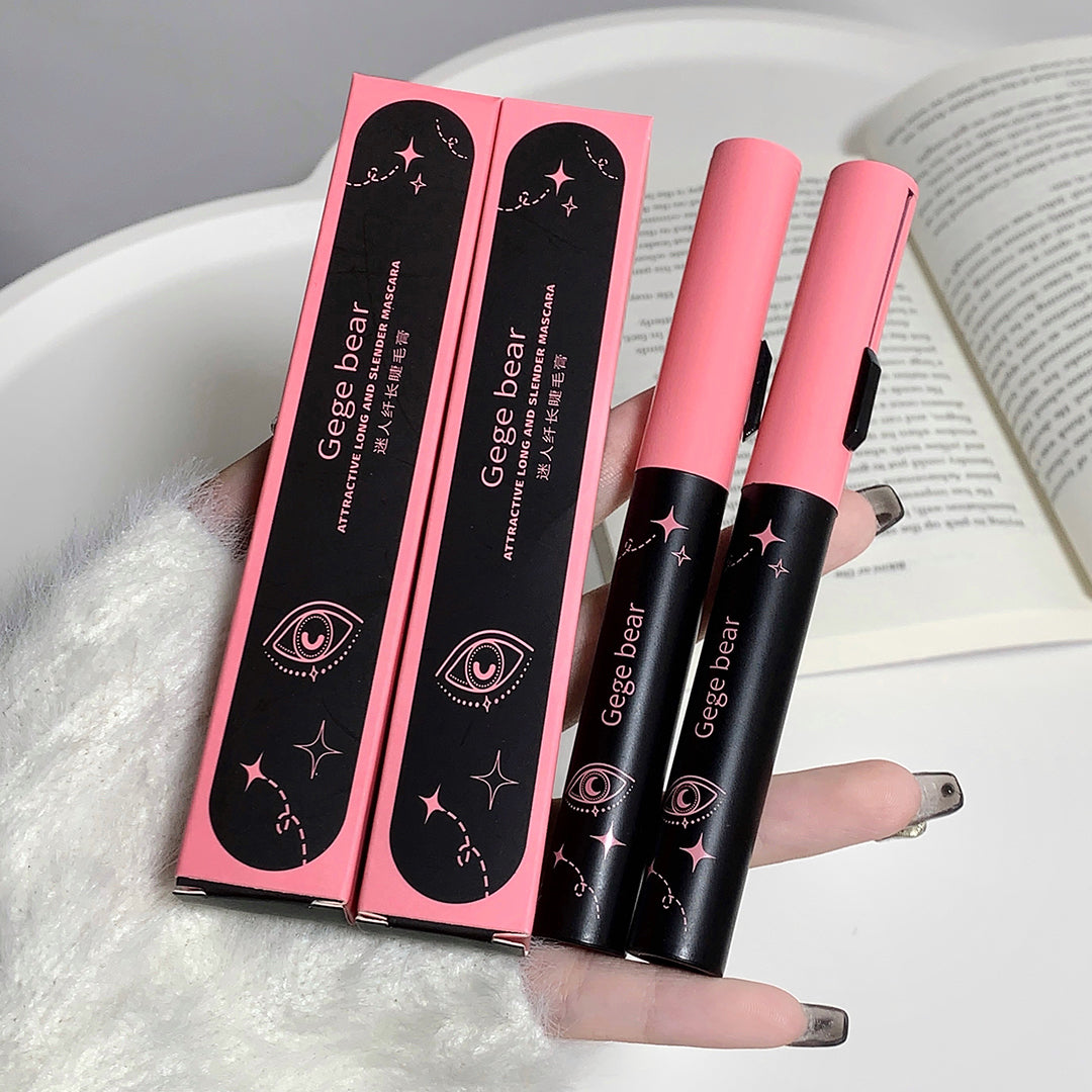 Pink and black makeup products with 'Gage bear' packaging held by a hand.
